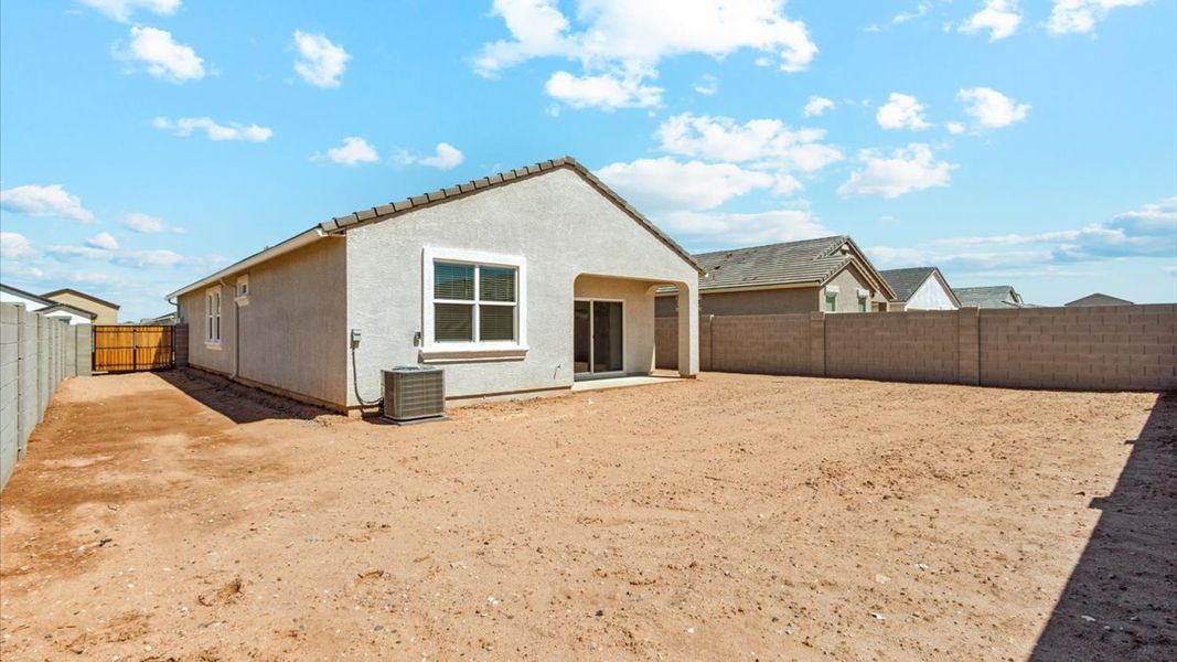 Exterior details and patio area of a home in Radiance at Superstition Vistas, Apache Junction (Image 16).