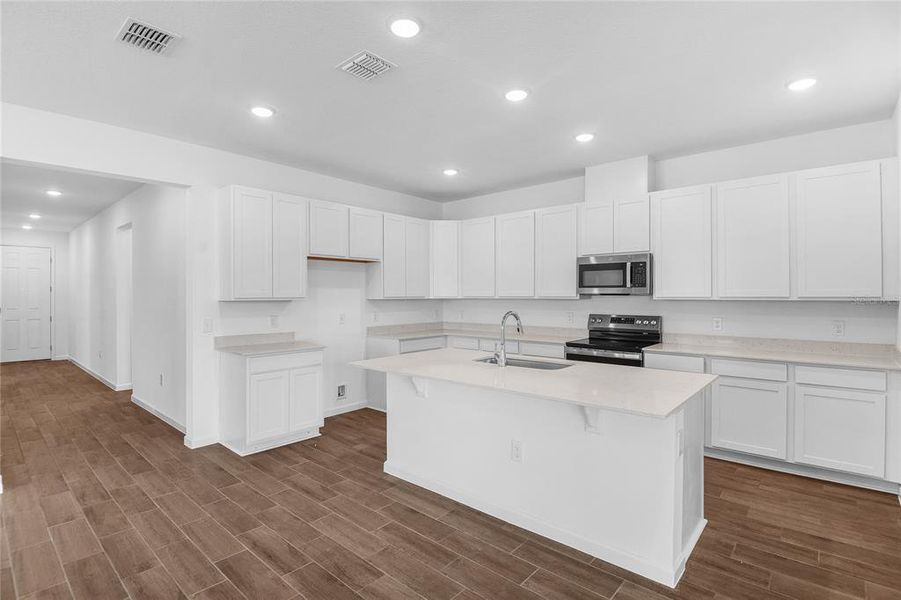 Furnished interior view inside a new home in Annabelle Estates, Lake Wales (Image 5). Furnished interior view inside a new home in Annabelle Estates, Lake Wales (Image 5).