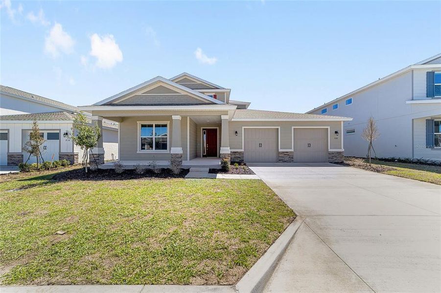 Front exterior of a new home in Calesa Township, Ocala, FL, highlighting curb appeal (Image 20).