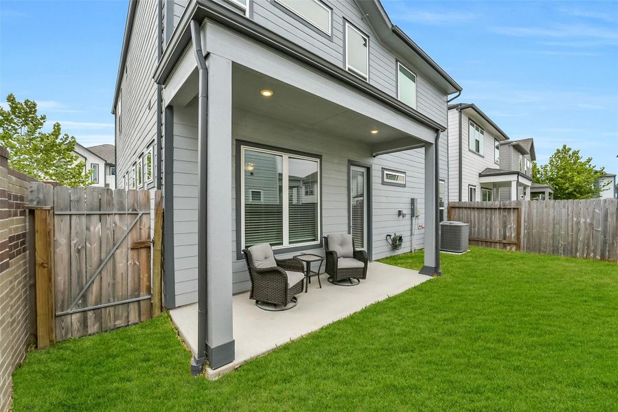 Exterior details and patio area of a home in , Houston (Image 3).