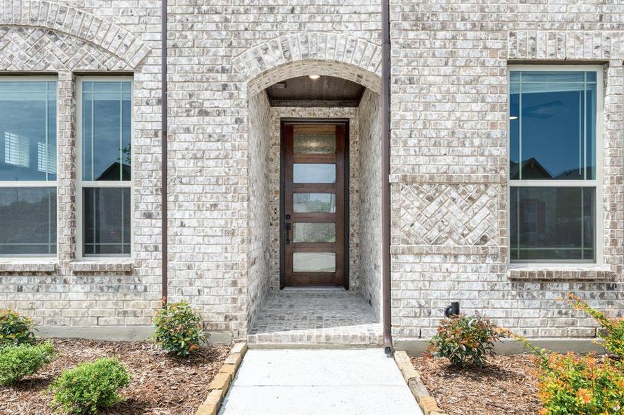 Exterior details and patio area of a home in Sonoma Verde, Rockwall (Image 27).