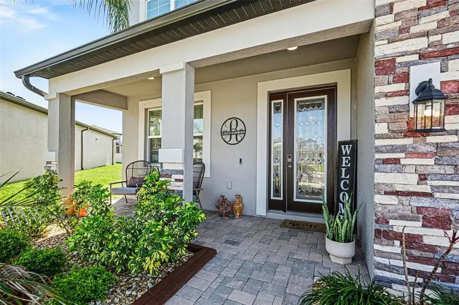 Exterior details and patio area of a home in Berry Bay, Wimauma (Image 3).