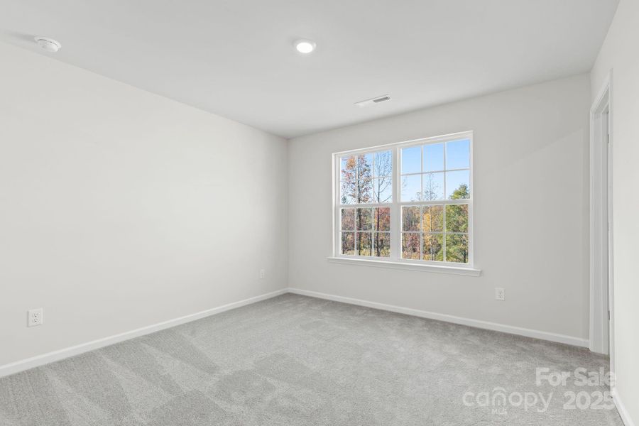 Spacious, unfurnished interior of a new home in Bell Farm: 60's, Statesville (Image 28).