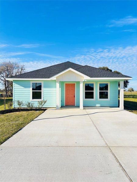 Front exterior of a new home in , Palacios, TX, highlighting curb appeal (Image 26).