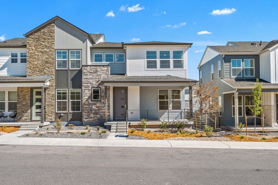 Front exterior of a new home in Trumark Homes at Sterling Ranch, Littleton, CO, highlighting curb appeal (Image 1). Front exterior of a new home in Trumark Homes at Sterling Ranch, Littleton, CO, highlighting curb appeal (Image 1).