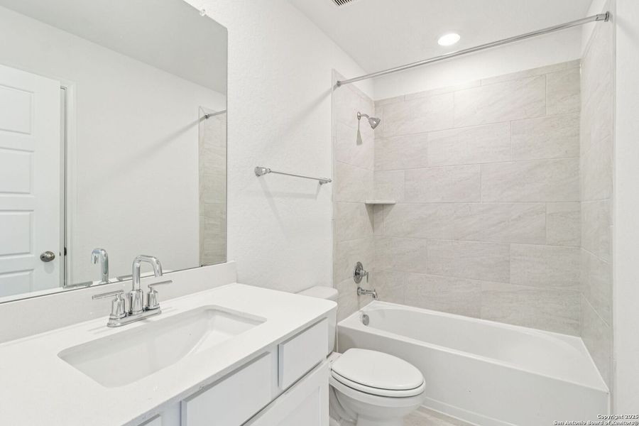 Furnished interior view inside a new home in Legendary Trails - Classic Series, Cibolo (Image 8).