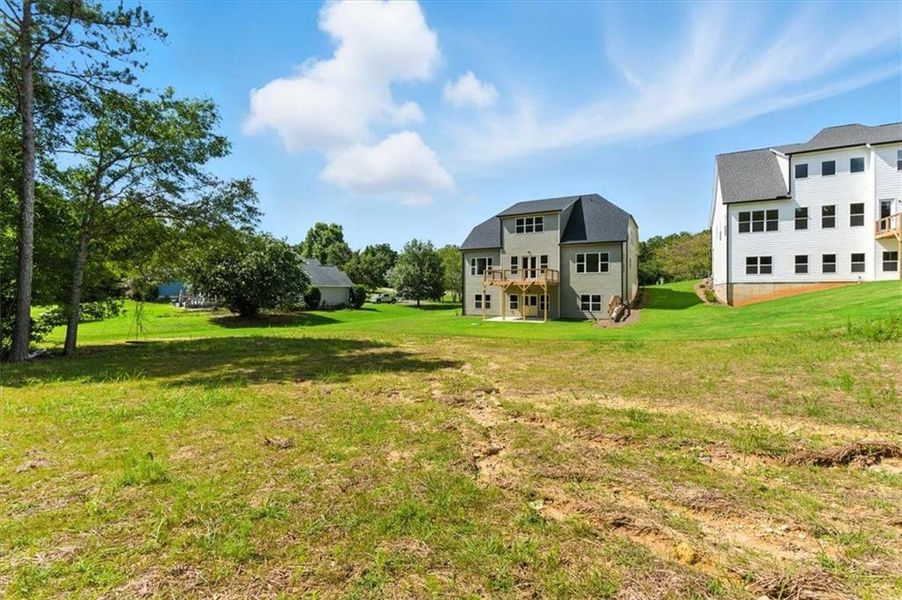 Front exterior of a new home in , Rome, GA, highlighting curb appeal (Image 25). Front exterior of a new home in , Rome, GA, highlighting curb appeal (Image 25).