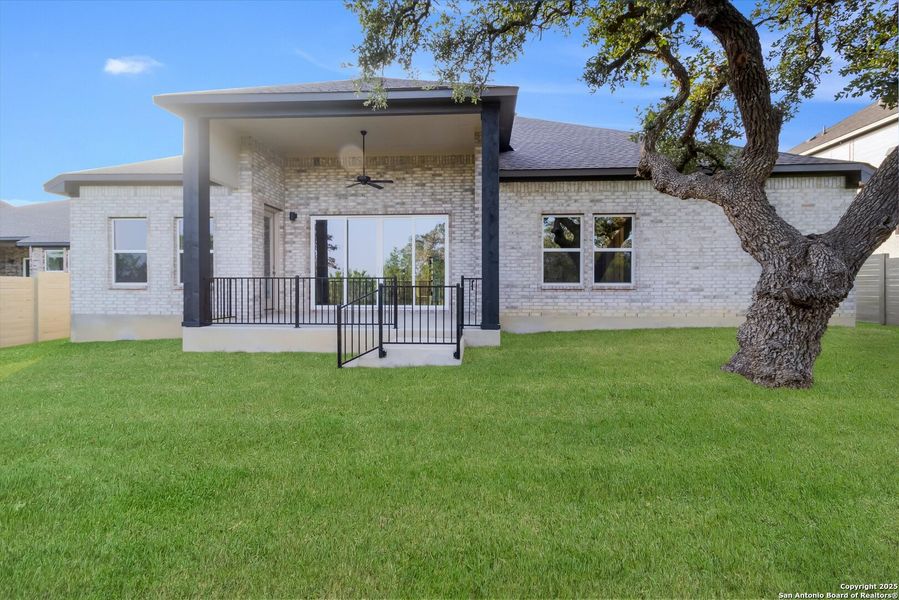 Front exterior of a new home in The Grove at Vintage Oaks, New Braunfels, TX, highlighting curb appeal (Image 2).