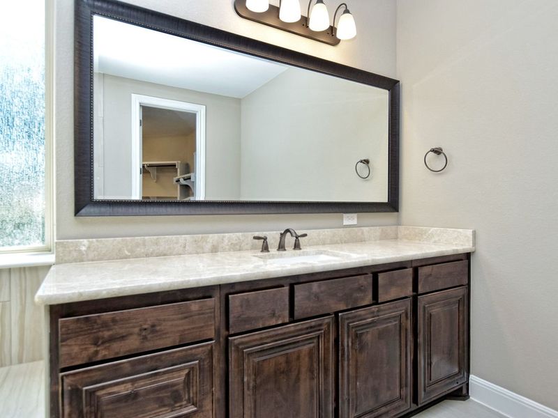Representative furnished interior of a home built from the Catalina by Giddens Homes in Clearwater Ranch, Liberty Hill (Image 12).
