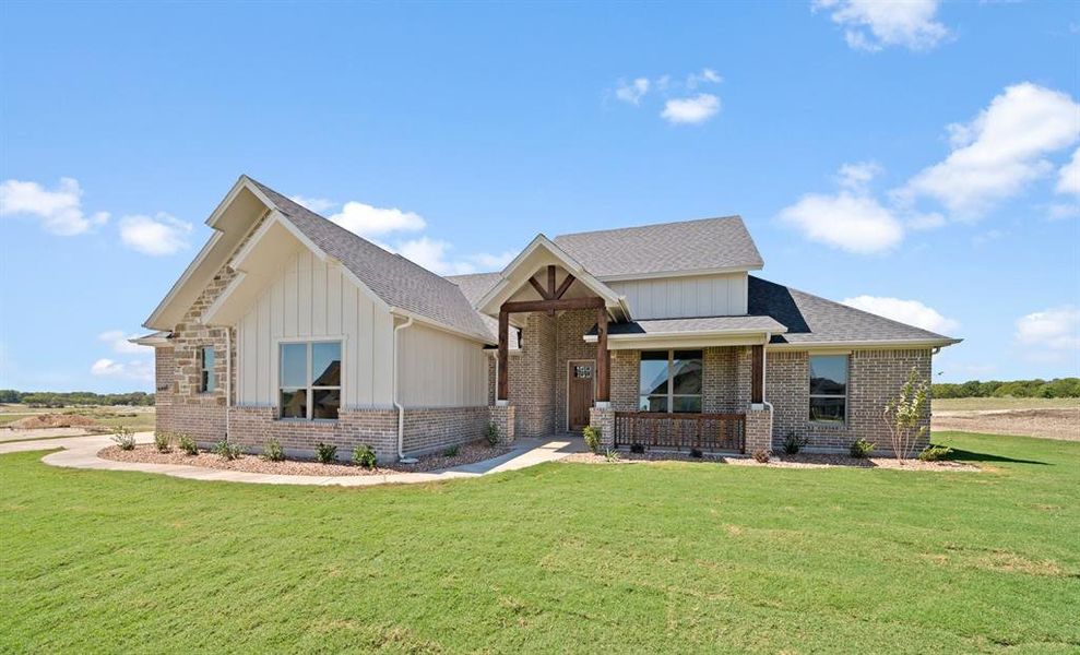 Front exterior of a new home in , Waxahachie, TX, highlighting curb appeal (Image 12).