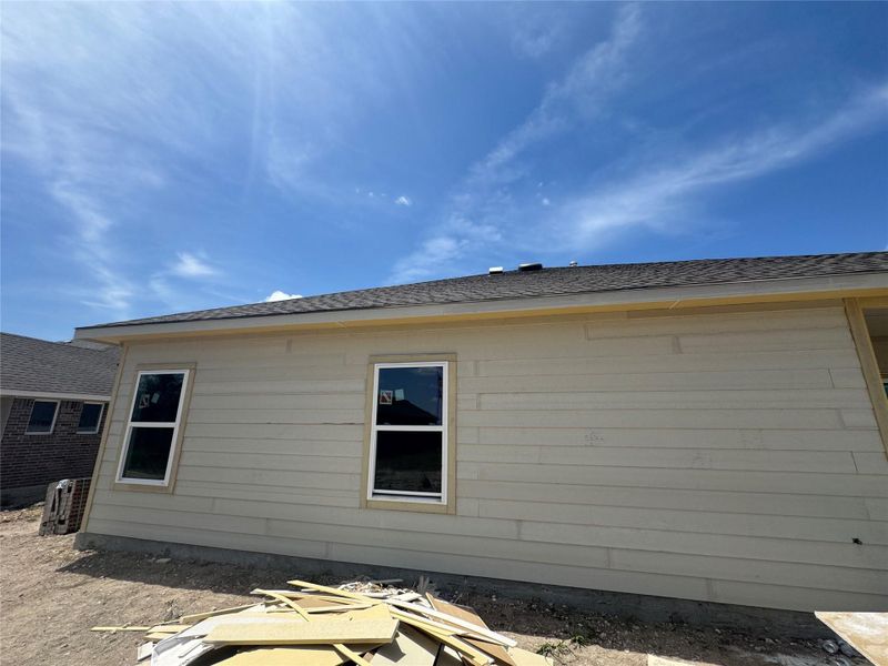 Front exterior of a new home in Village at Three Oaks, Seguin, TX, highlighting curb appeal (Image 2). Front exterior of a new home in Village at Three Oaks, Seguin, TX, highlighting curb appeal (Image 2).