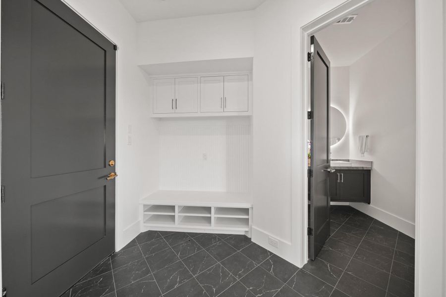 First floor custom mudroom space, neighboring the first floor powder bath. Make this spectacular home yours, TODAY!!!! First floor custom mudroom space, neighboring the first floor powder bath. Make this spectacular home yours, TODAY!!!!