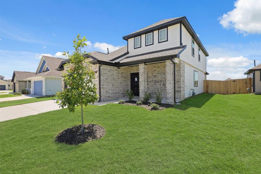 Front exterior of a new home in Rocky Creek Crossing, Fort Worth, TX, highlighting curb appeal (Image 13).