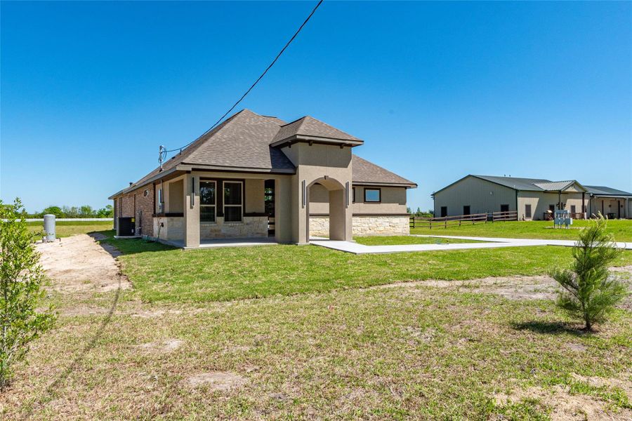 Front exterior of a new home in , Dayton, TX, highlighting curb appeal (Image 23). Front exterior of a new home in , Dayton, TX, highlighting curb appeal (Image 23).