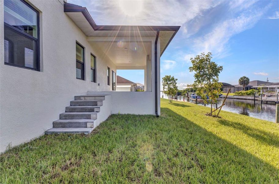 Front exterior of a new home in , Port Charlotte, FL, highlighting curb appeal (Image 2).