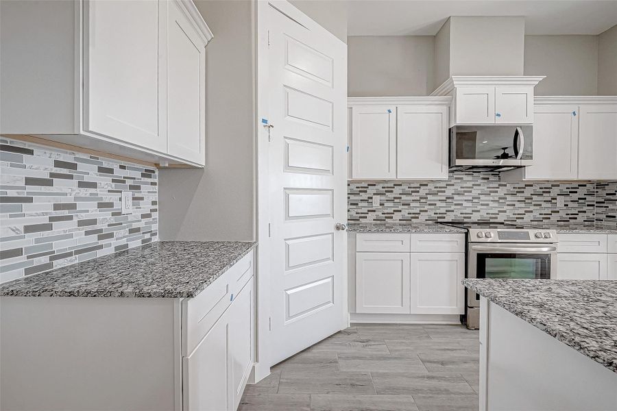 Furnished interior view inside a new home in , Needville (Image 7).