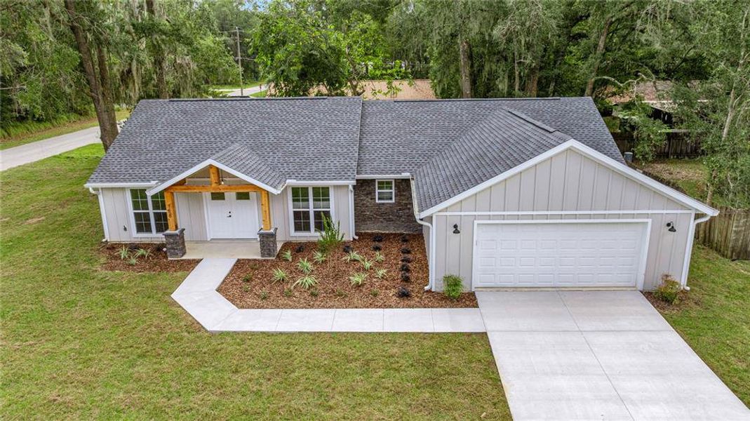 Front exterior of a new home in , Ocala, FL, highlighting curb appeal (Image 20).