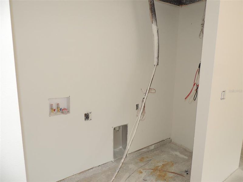 Laundry room in Garage