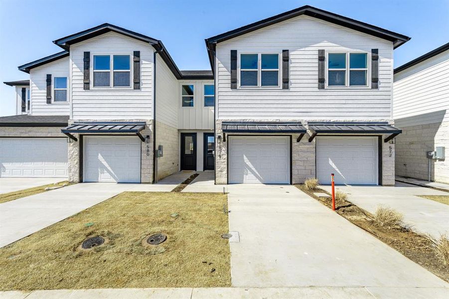 Front exterior of a new home in , Stephenville, TX, highlighting curb appeal (Image 16). Front exterior of a new home in , Stephenville, TX, highlighting curb appeal (Image 16).