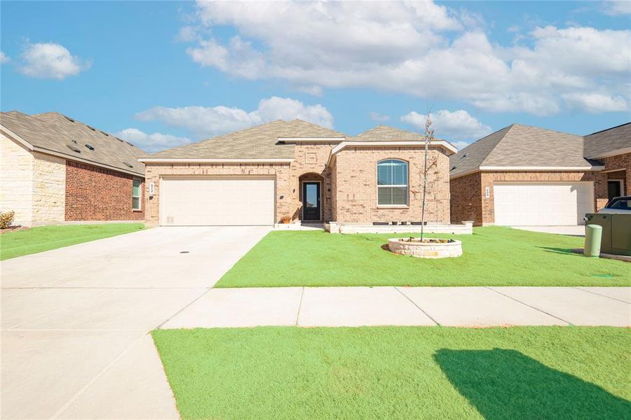 Front exterior of a new home in Bridgewater, Princeton, TX, highlighting curb appeal (Image 2). Front exterior of a new home in Bridgewater, Princeton, TX, highlighting curb appeal (Image 2).