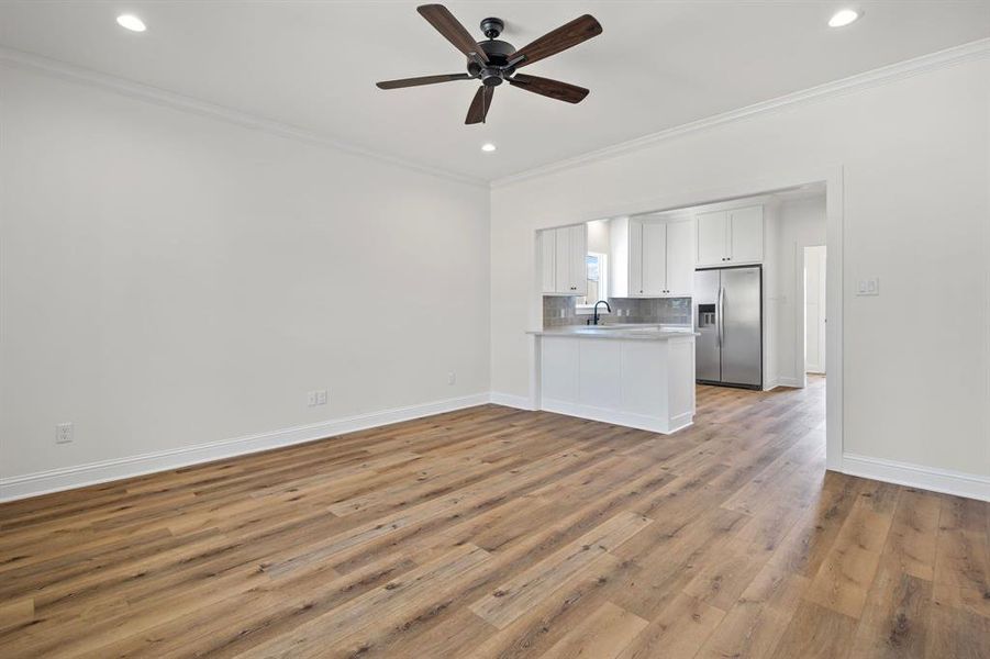 LVP, recessed lighting, quartz tops and molding are some the designer touches.