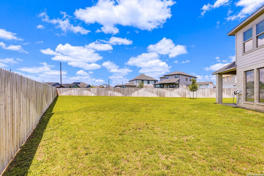 Exterior details and patio area of a home in Kallison Ranch, San Antonio (Image 24).