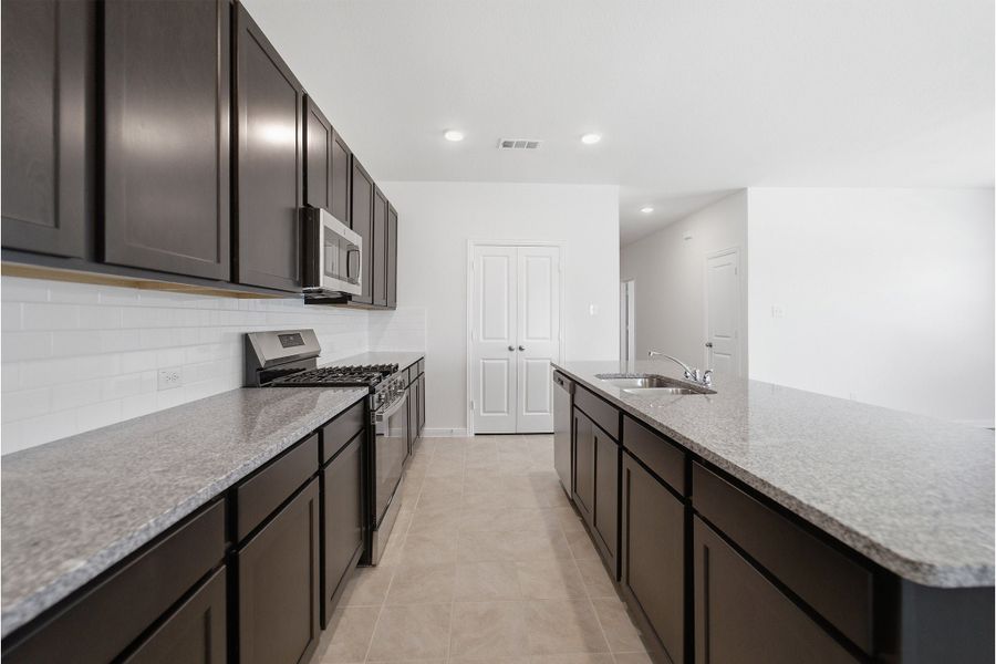 Furnished interior view inside a new home in Sagebrook, Argyle (Image 8).