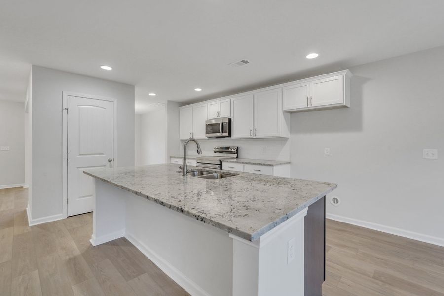 Representative furnished interior of a home built from the The Birch by Smith Family Homes in Lakeview Pines, Statesboro (Image 10).