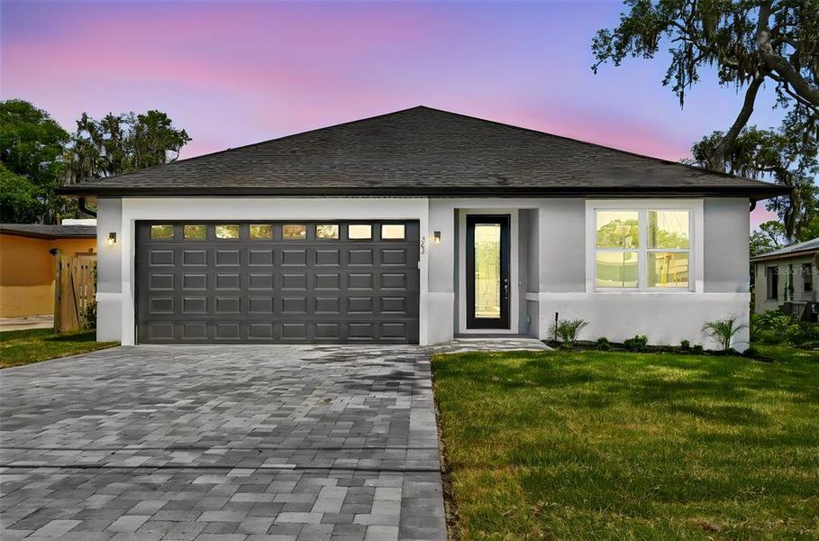 Front exterior of a new home in , Casselberry, FL, highlighting curb appeal (Image 1). Front exterior of a new home in , Casselberry, FL, highlighting curb appeal (Image 1).