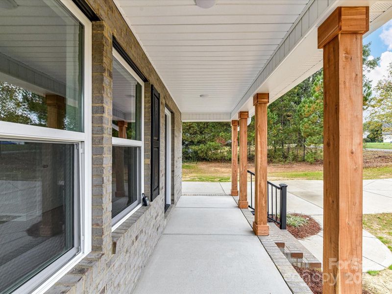 Exterior details and patio area of a home in , Oakboro (Image 23).