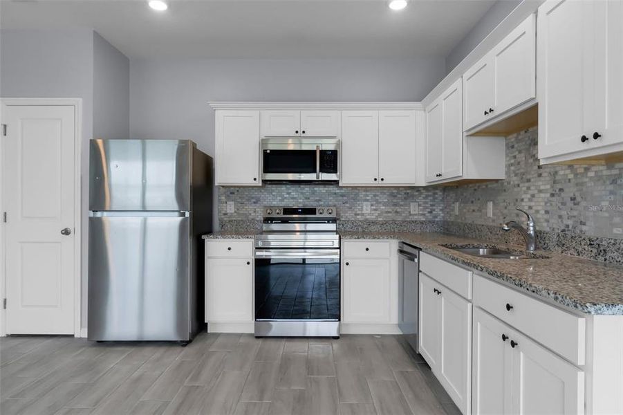 Furnished interior view inside a new home in Ashford Place, St. Cloud (Image 6). Furnished interior view inside a new home in Ashford Place, St. Cloud (Image 6).