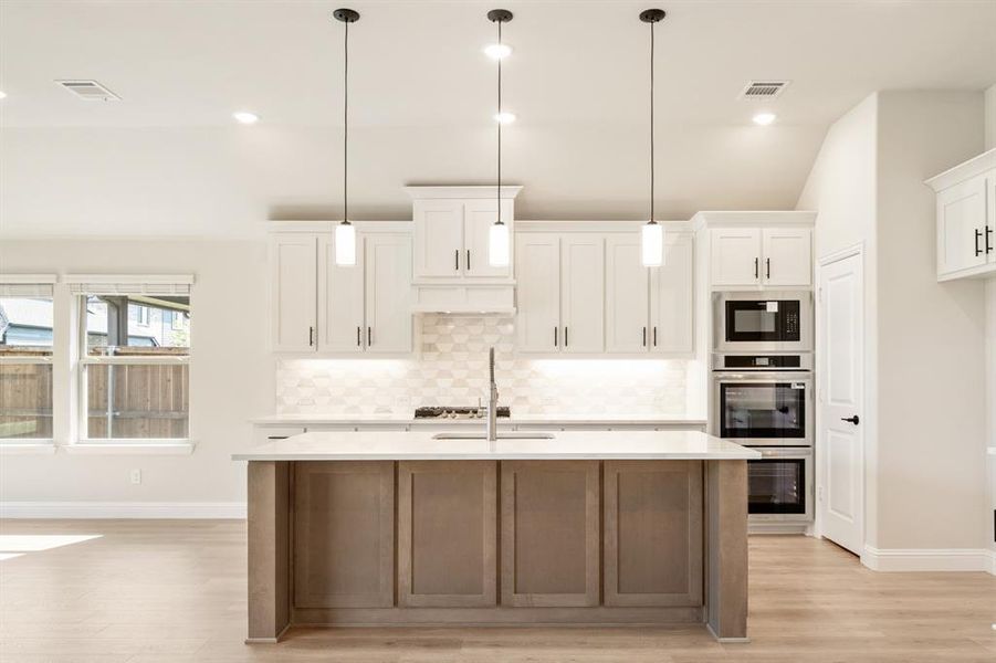 Furnished interior view inside a new home in Woodstone, Providence Village (Image 5).