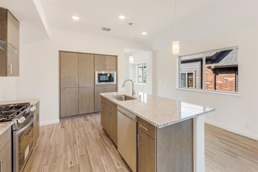Furnished interior view inside a new home in Bear Creek Elements, Lavon (Image 11).
