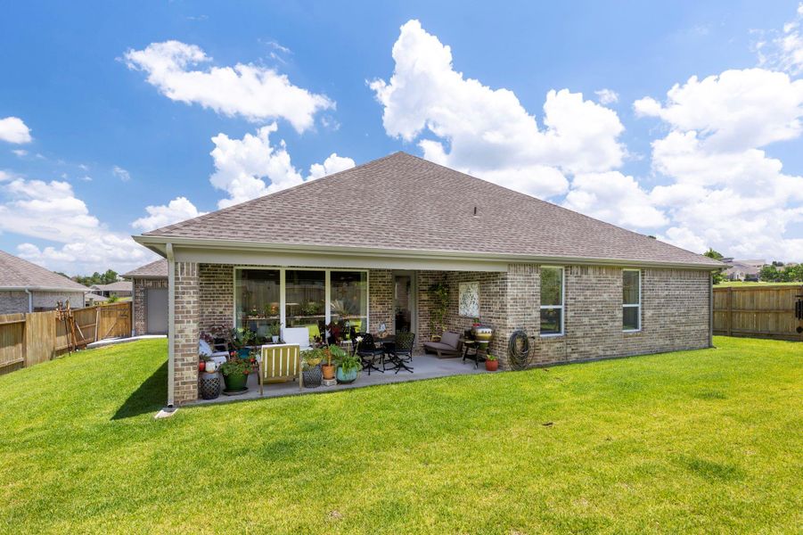 Front exterior of a new home in Water Crest on Lake Conroe - LAKE FRONT, Conroe, TX, highlighting curb appeal (Image 20). Front exterior of a new home in Water Crest on Lake Conroe - LAKE FRONT, Conroe, TX, highlighting curb appeal (Image 20).