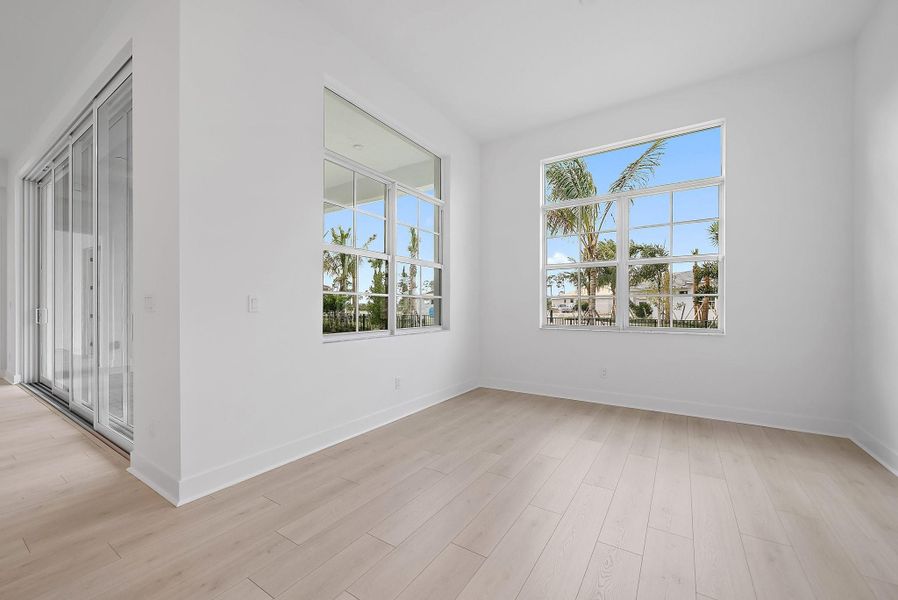 Spacious, unfurnished interior of a new home in L'Ambiance at Avenir, Palm Beach Gardens (Image 41).