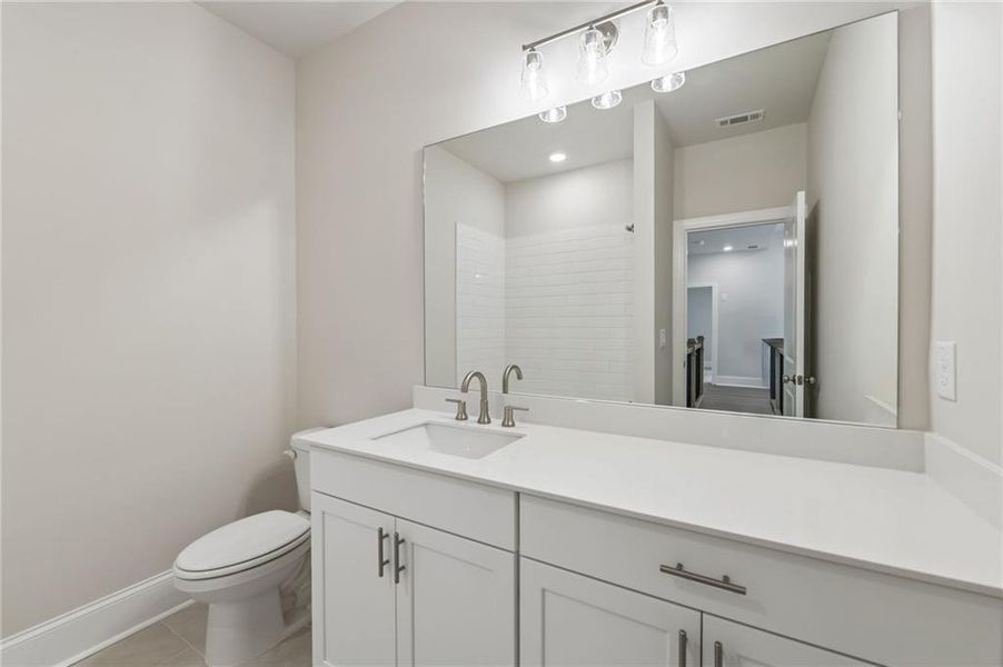Furnished interior view inside a new home in Waterhaven, Cumming (Image 11).