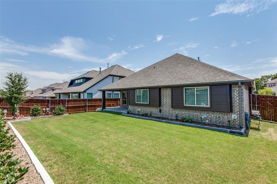 Front exterior of a new home in Emerald Vista, Wylie, TX, highlighting curb appeal (Image 2).