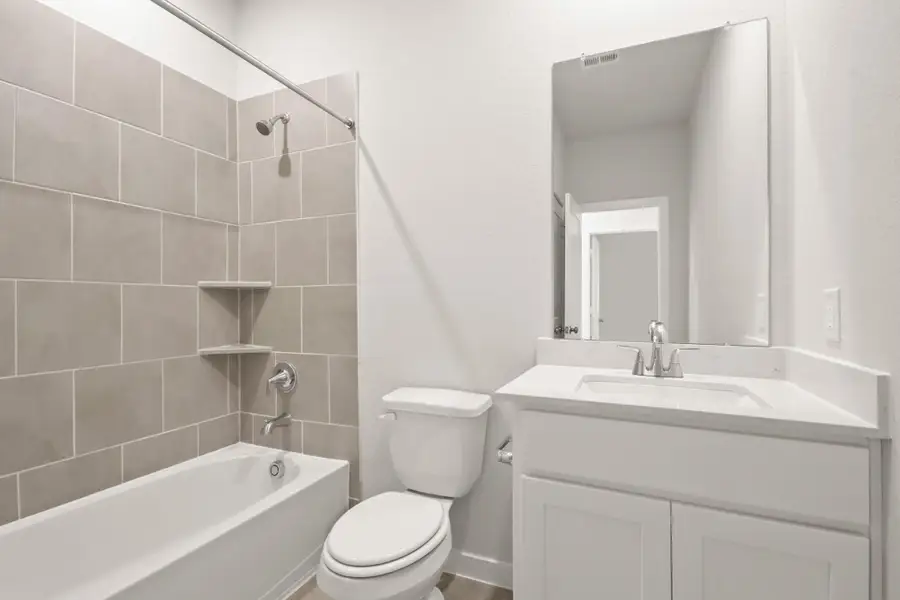 Furnished interior view inside a new home in Northpark South, Porter (Image 6). Furnished interior view inside a new home in Northpark South, Porter (Image 6).