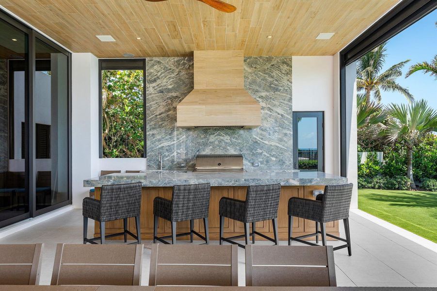 Exterior details and patio area of a home in , Manalapan (Image 33).