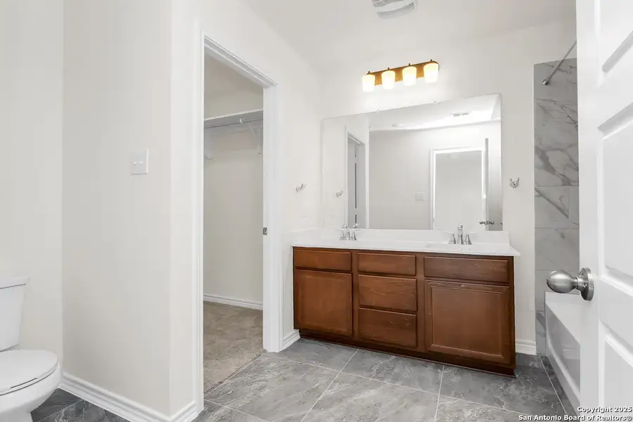 Furnished interior view inside a new home in Spanish Trails Villas, San Antonio (Image 5).