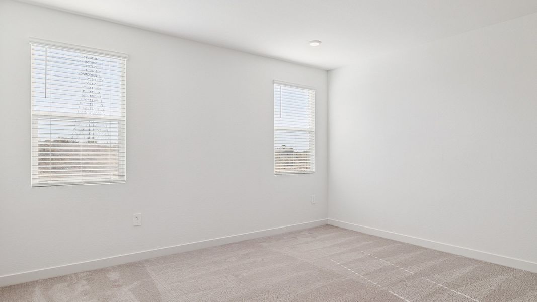 Representative unfurnished interior of a home built from the Crow by D.R. Horton in The Ridge at Stone Butte, Phoenix (Image 34).