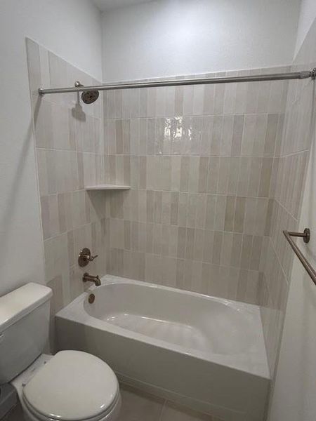 Secondary bath with custom tile design. Secondary bath with custom tile design.