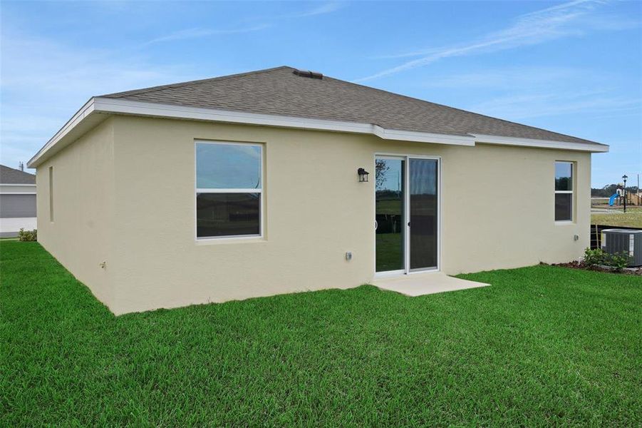 Exterior details and patio area of a home in Annabelle Estates, Lake Wales (Image 4).