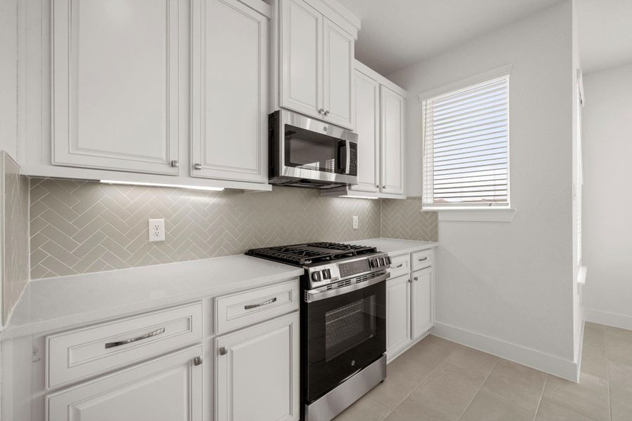 Furnished interior view inside a new home in Bridgeland, Cypress (Image 6).