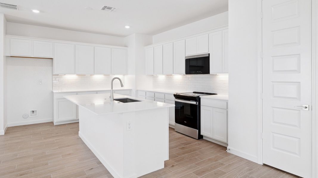 Representative furnished interior of a home built from the Apache by D.R. Horton in Zanjero Pass, Glendale (Image 8).
