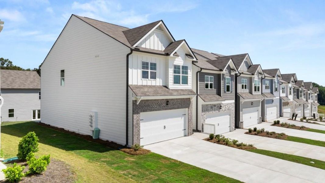Front exterior of a new home in Rolling Meadows, Jasper, GA, highlighting curb appeal (Image 2). Front exterior of a new home in Rolling Meadows, Jasper, GA, highlighting curb appeal (Image 2).