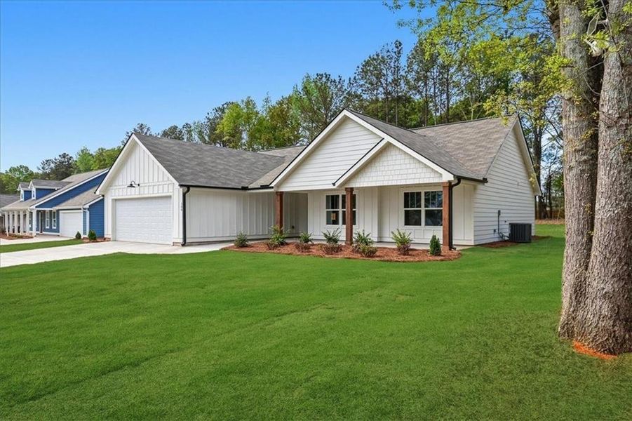 Front exterior of a new home in , Hartwell, GA, highlighting curb appeal (Image 22).
