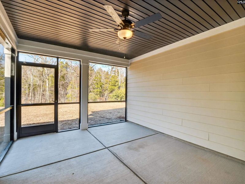 Exterior details and patio area of a home in Collins Cove, Chapin (Image 4).
