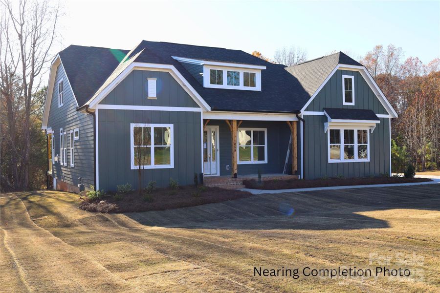 Front exterior of a new home in Shepherds Trace, Clover, SC, highlighting curb appeal (Image 1).
