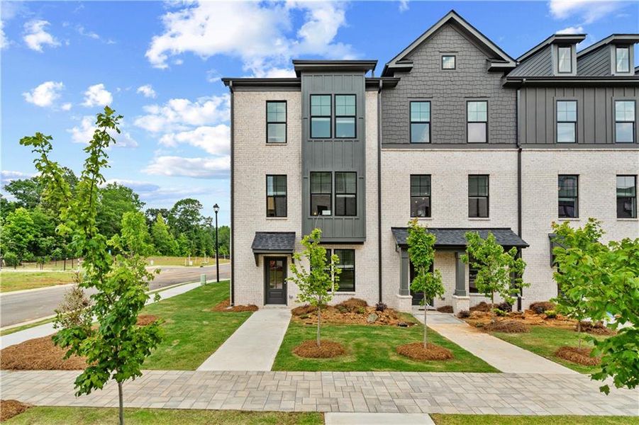 Front exterior of a new home in Silverock, McDonough, GA, highlighting curb appeal (Image 20).
